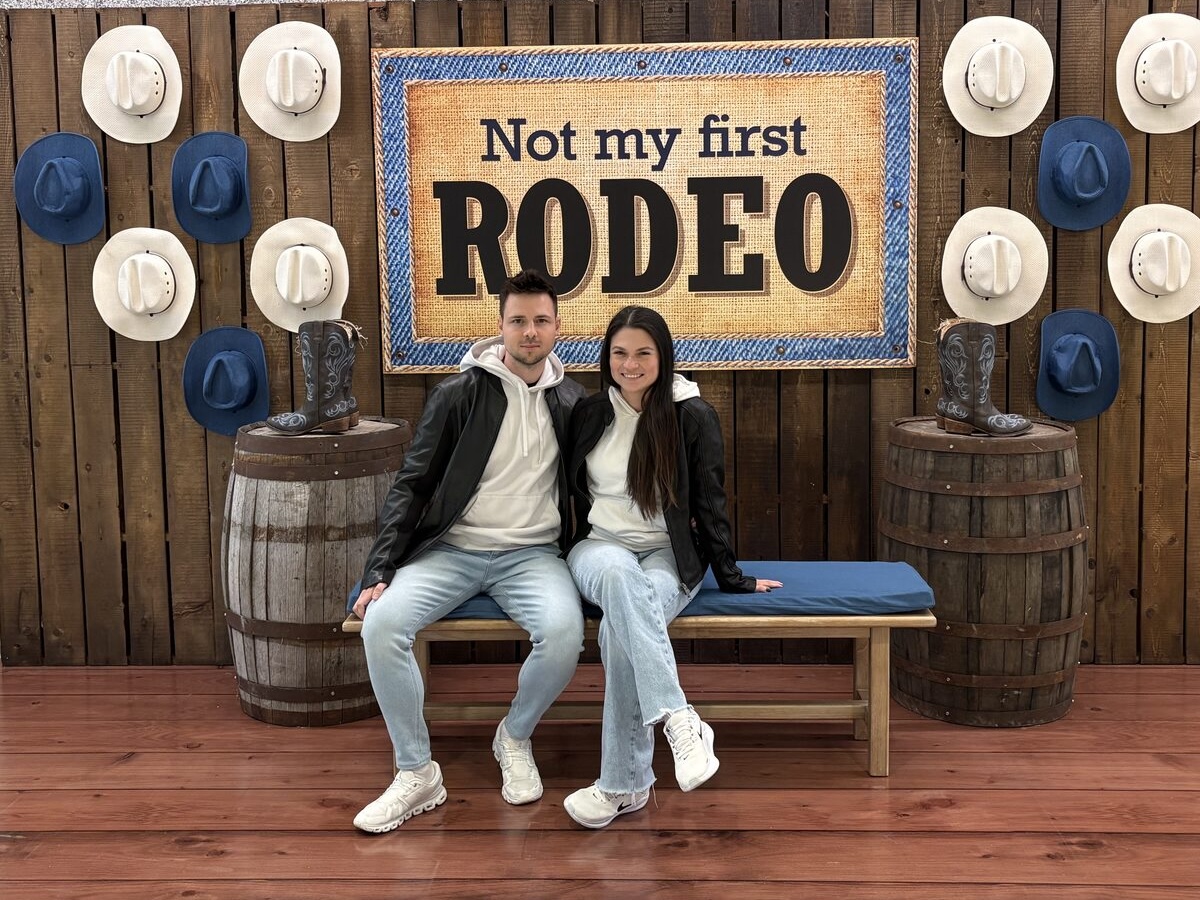 Couple at a Calgary rodeo photo backdrop