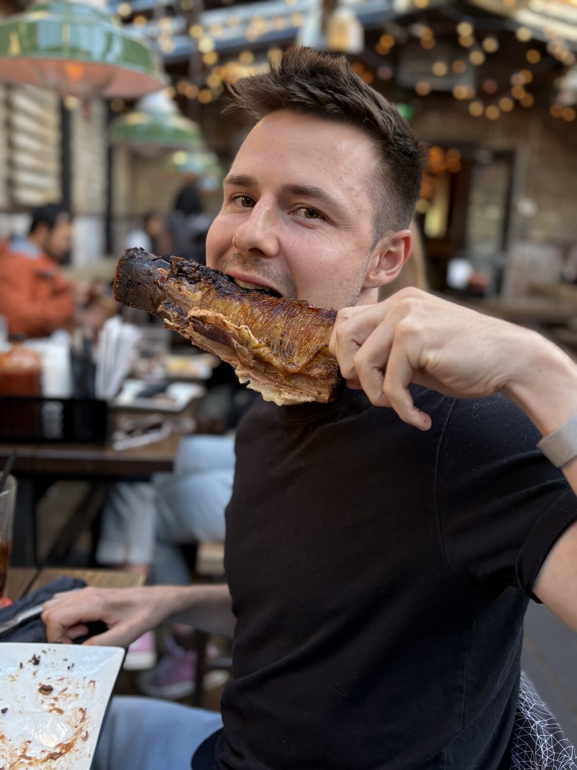 Eating barbecue ribs in Calgary