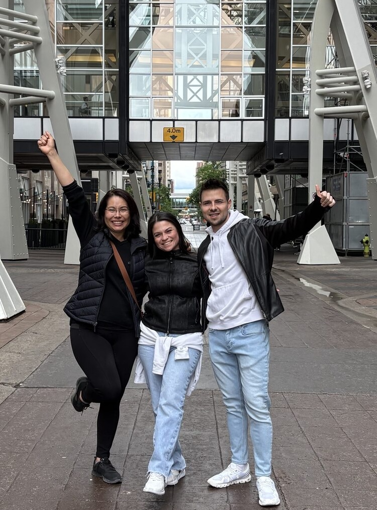Friends walking through downtown Calgary