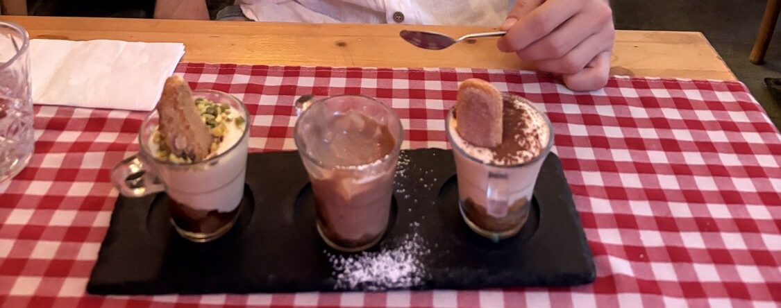 Dessert and a portrait during dinner in Monterosso