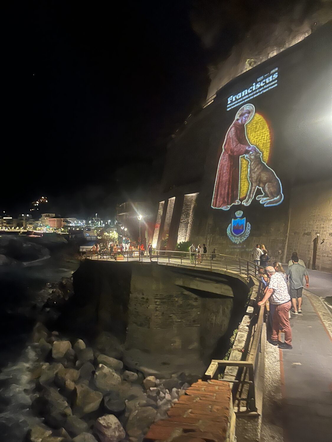 Walking along the Monterosso promenade at night
