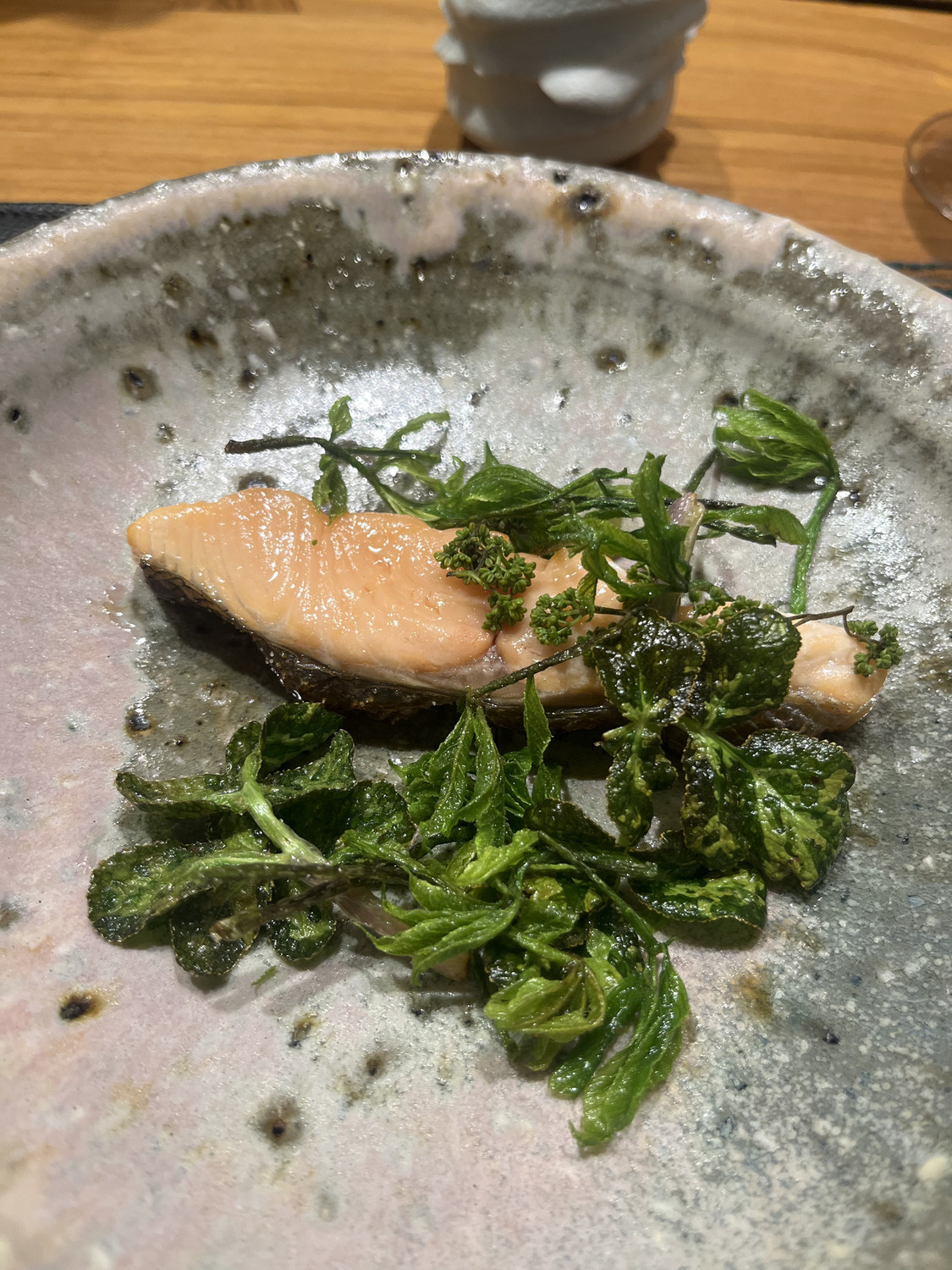 Grilled fish with fried greens