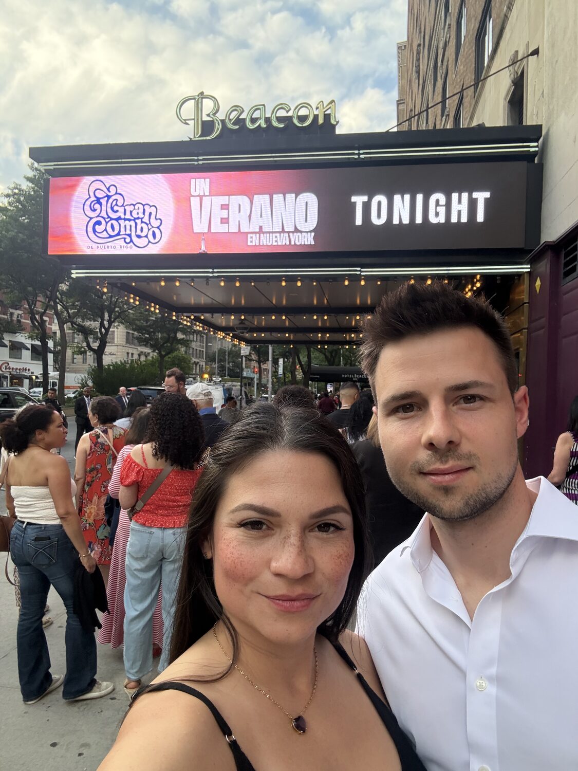 Couple outside the Beacon Theatre before the El Gran Combo concert