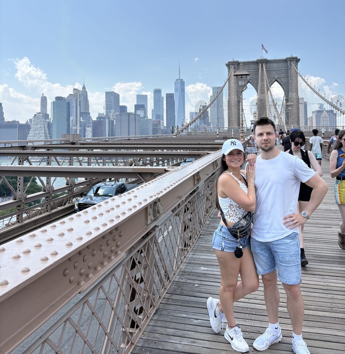 Couple portrait on the Brooklyn Bridge