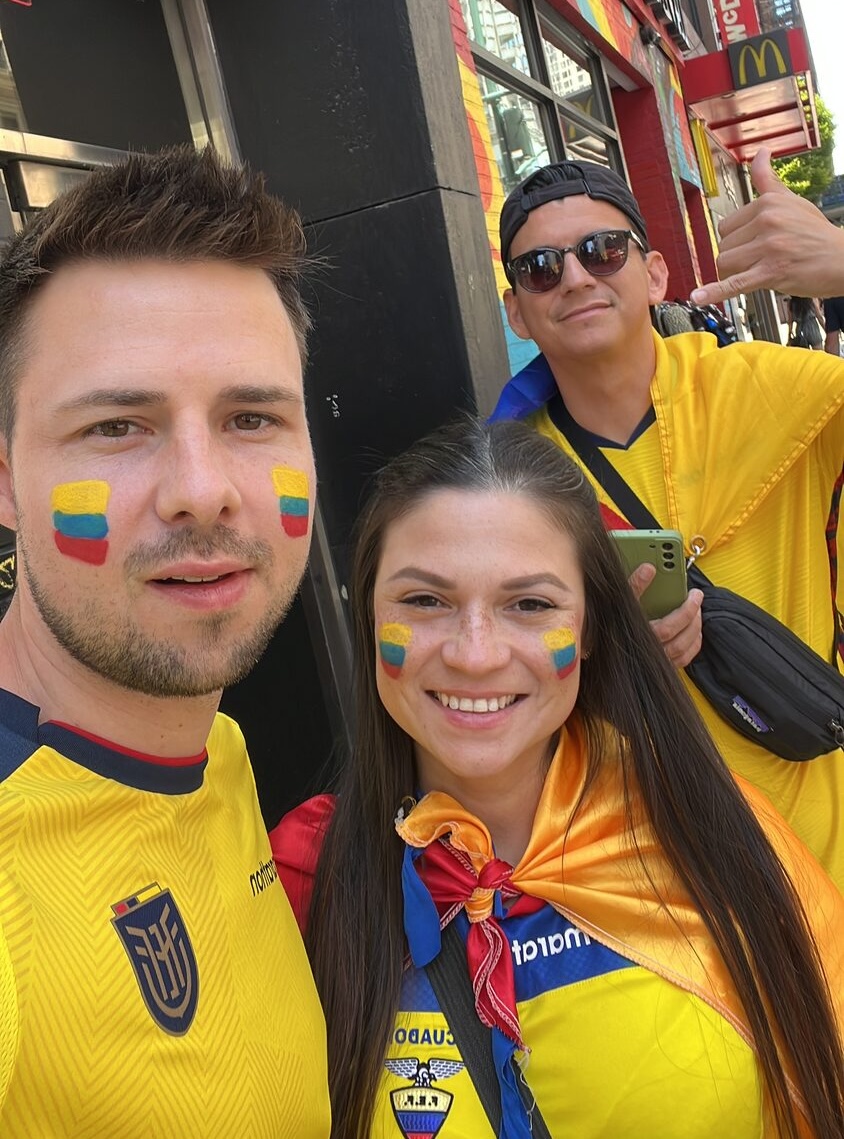 Couple in Ecuador jerseys on World Cup day in Times Square